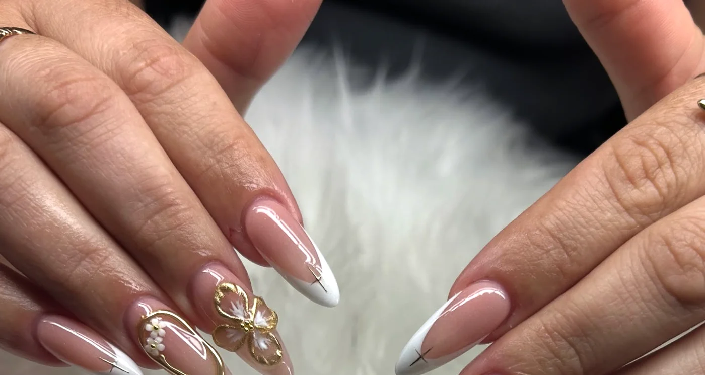 Gold flower nail art by HM Beauty Spa